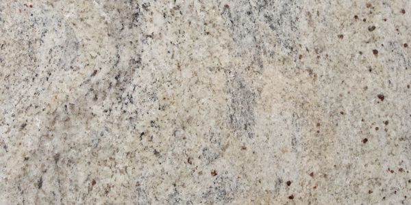 Close-up of a speckled granite surface with varied colors.
