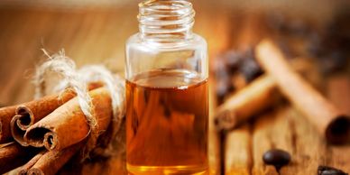 Cinnamon bark oil in glass bottle