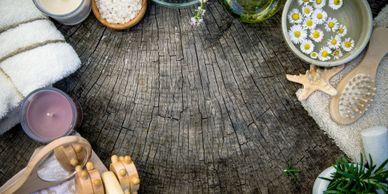 Wood, flowers, candles, massage and rosemary.