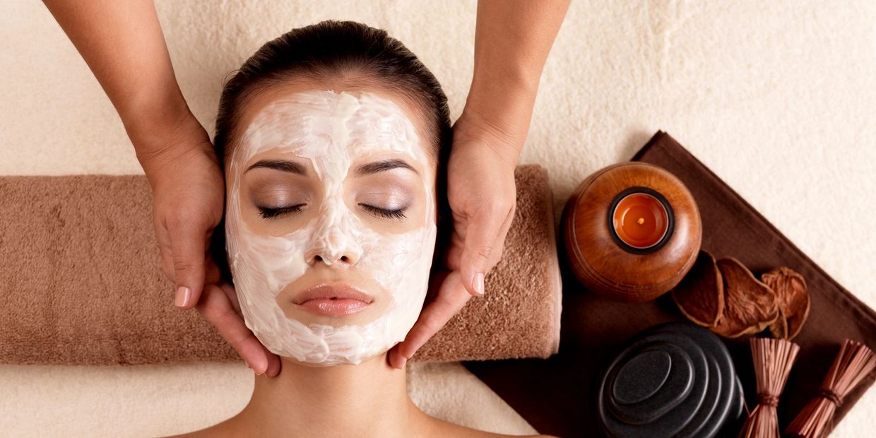 Top view of a girl taking Facial treatment