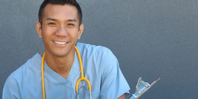 "Smiling medical professional with stethoscope, protected by Abrams life insurance."