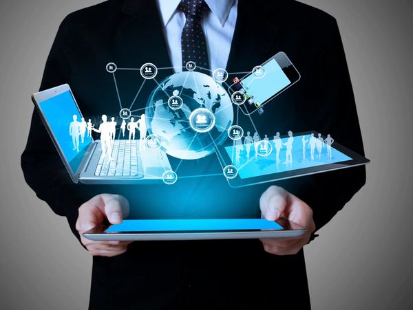 office man with laptop, phone and tablet in hands. it concept