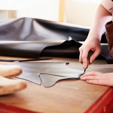 Leather being cut for repair