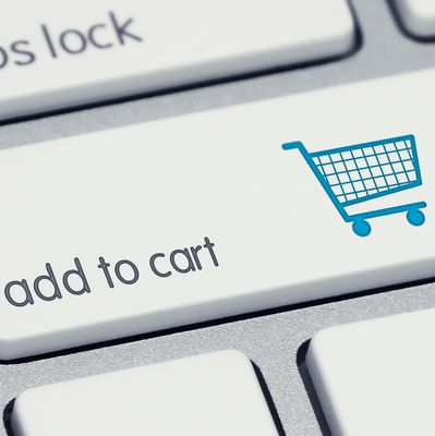 Keyboard key with add to cart text and shopping cart icon.