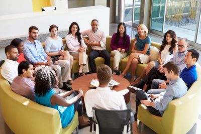 Employees meeting together