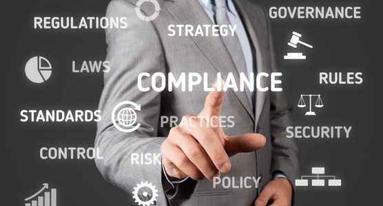 IT compliance best practices
Man selecting a digital representation of compliance.
