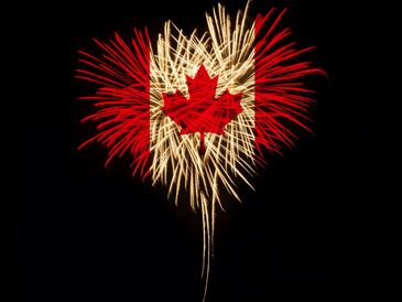 Fireworks display forming the Canadian flag with a maple leaf.