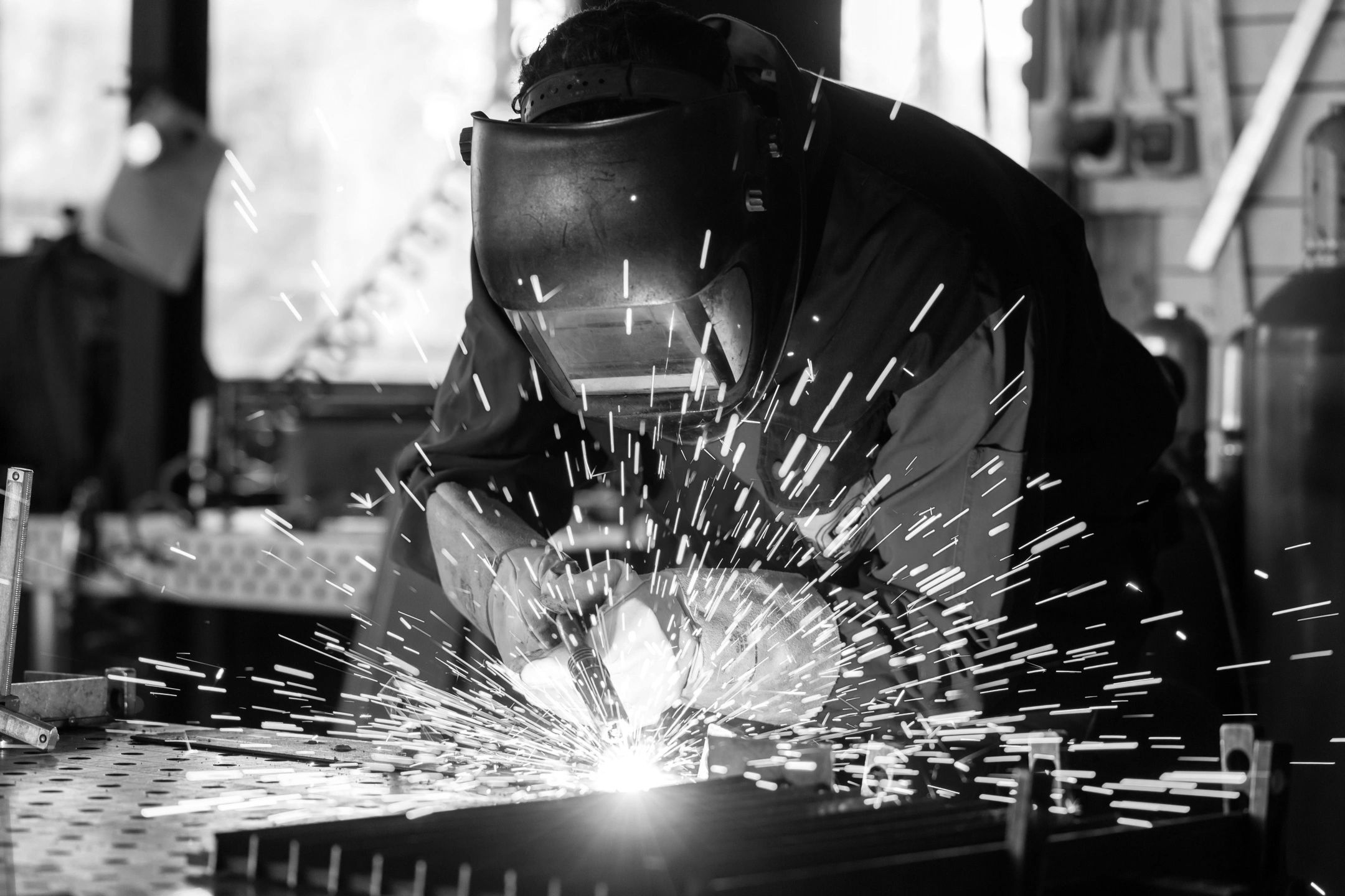 Fabrication welder making a custom fitted gate installation for chain link fence project Murphy, NC