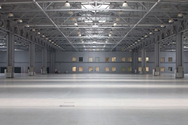 Neatly cleaned warehouse floor with bright light