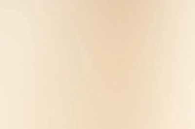 Soft gradient background with warm beige tones.