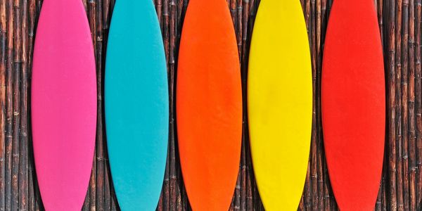 5 surf boards representing the essential five factors in special needs planning. 