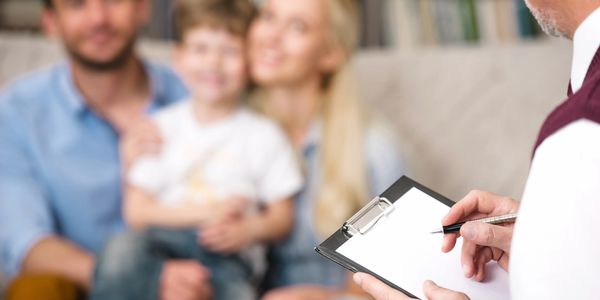 A military family meeting with a psychiatrist discussing medication prescription