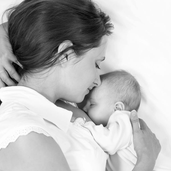 Mom and baby snuggling.