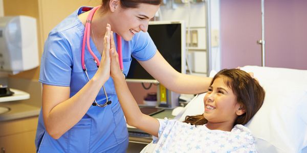 Nurse and young patient working together for patient's best care.