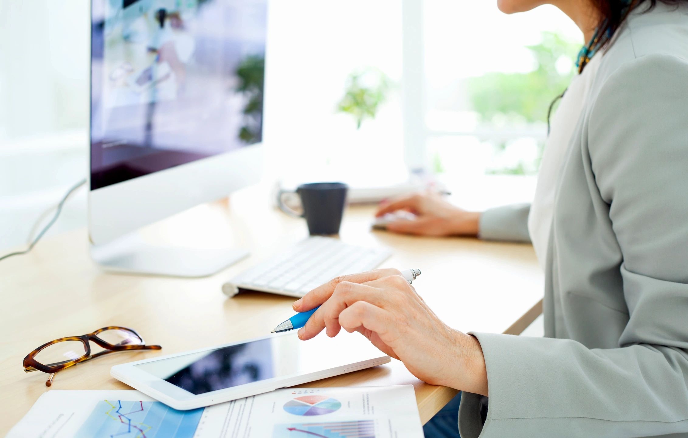 woman at computer entering accounting