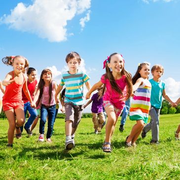 Kids running in a field