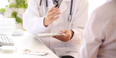 Doctor consulting a patient during a medical appointment.
