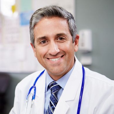 Image of doctor with stethoscope around his neck.