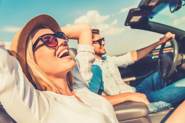 Enjoy the Open Road in Your Classic Car | Happy Couple Driving a Vintage Convertible on a Sunny Day