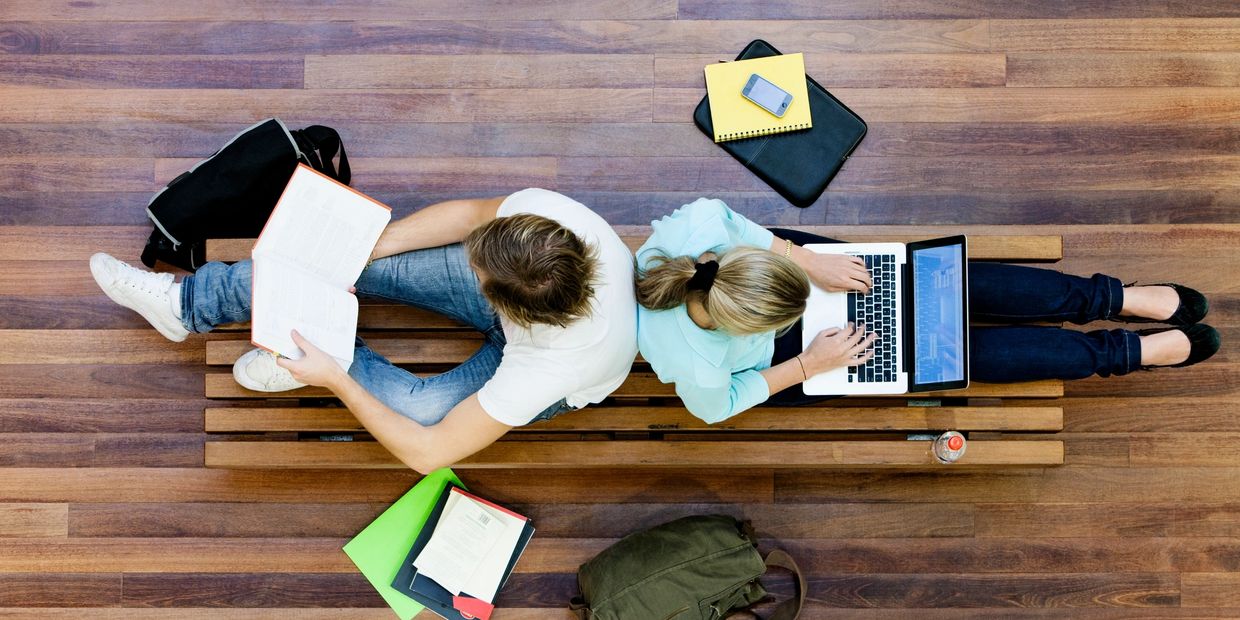 Boy and Girl students researching ATAR, 
QTAC, University, TAFE and Apprenticeship options. 