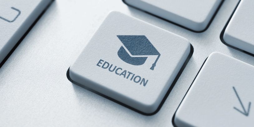 Keyboard key labeled 'Education' with a graduation cap icon.