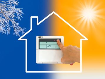 Thermostat inside outline of a house with a background going from cold blue (left) to warm yellow (r