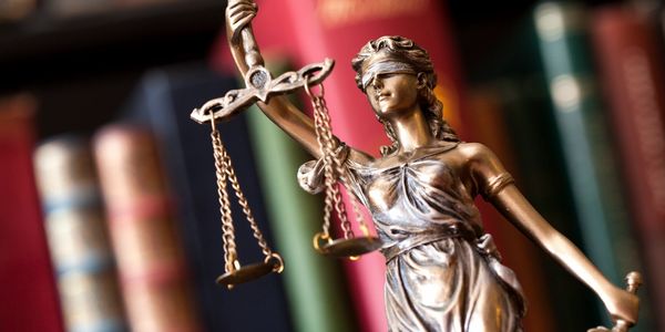 Justicia and the scales of justice