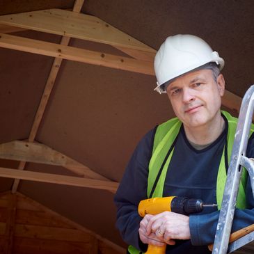 This is a construction worker who just passed an exam in a chiropractor's office to return to work. 