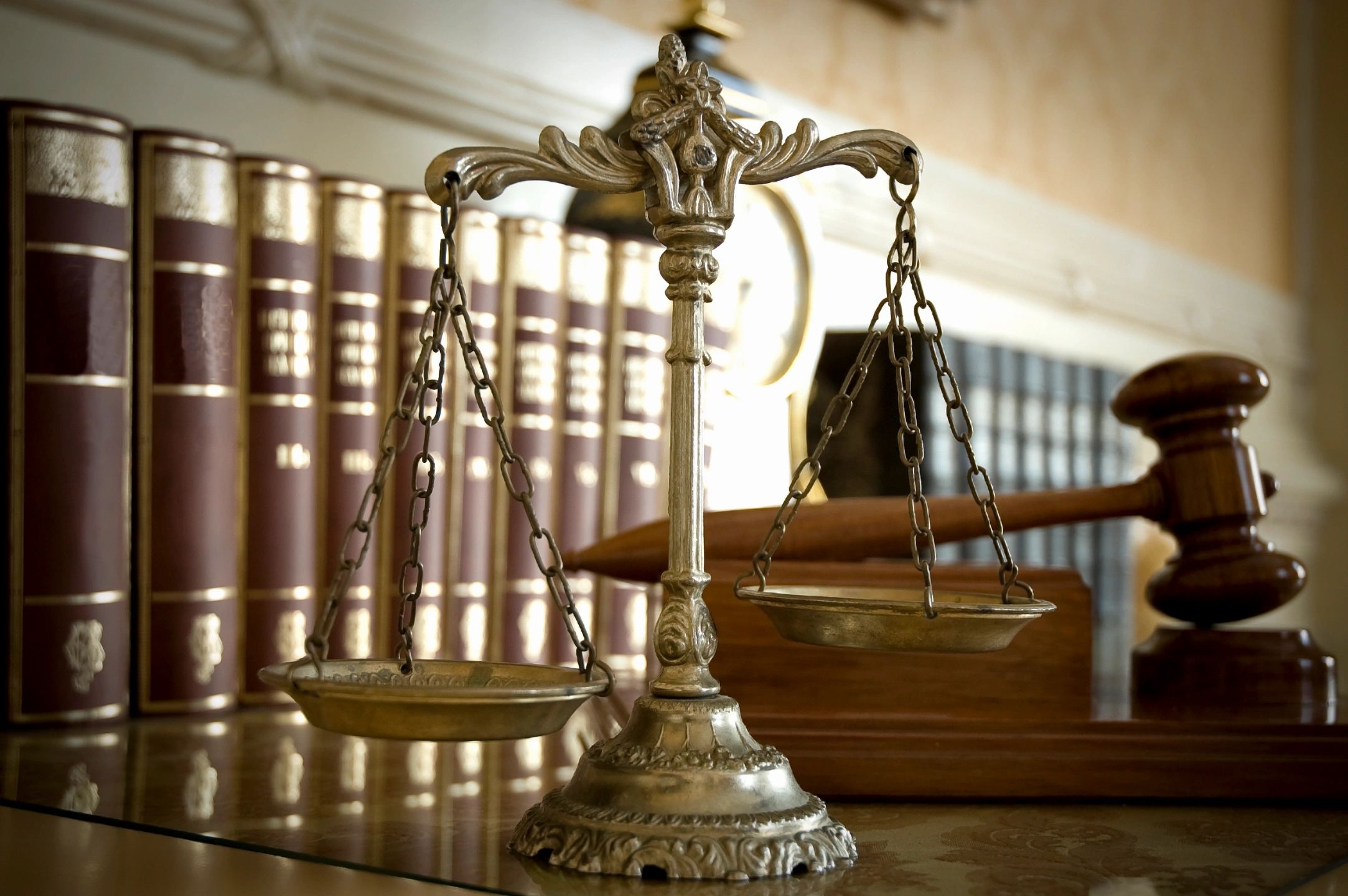 Scales; gavel; law books