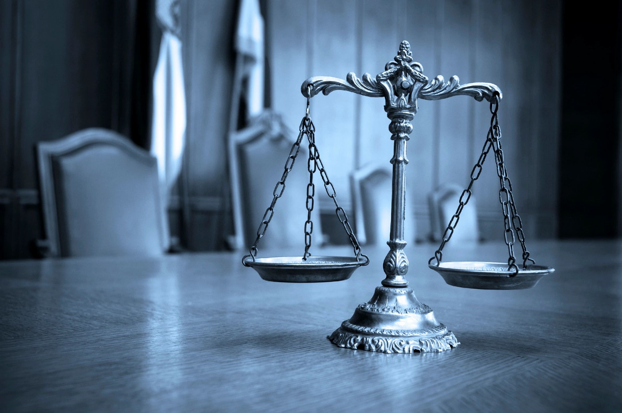Legal scales are shown, in balance.