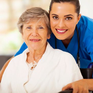 Nurse and senior smiling at the camera