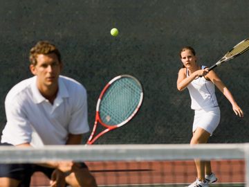 Mixed doubles tennis at Marcus Lewis Tennis Center