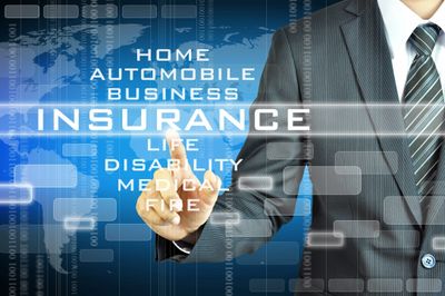 Businessman selecting insurance options on a digital interface.