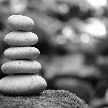 Stacked smooth stones symbolizing balance and tranquility.