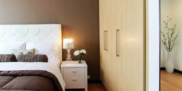Stylish bedroom interior featuring a Bed