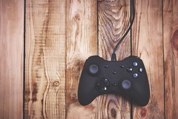 An xbox controller on a desk