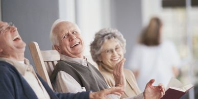 Happy elders sitting together