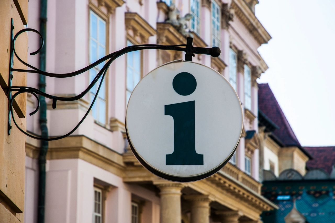 A coffee shop sign shows it's availability of internet use.