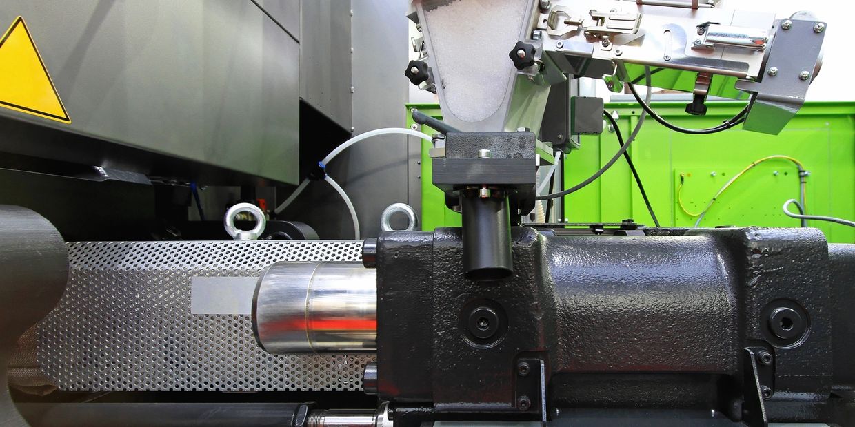 Close-up of industrial machinery with precise measurement scale and components.