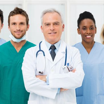 A group of confident medical professionals standing together.