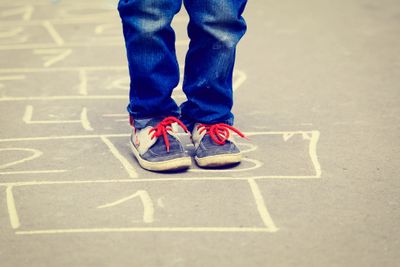 Child hopscotch, gross motor