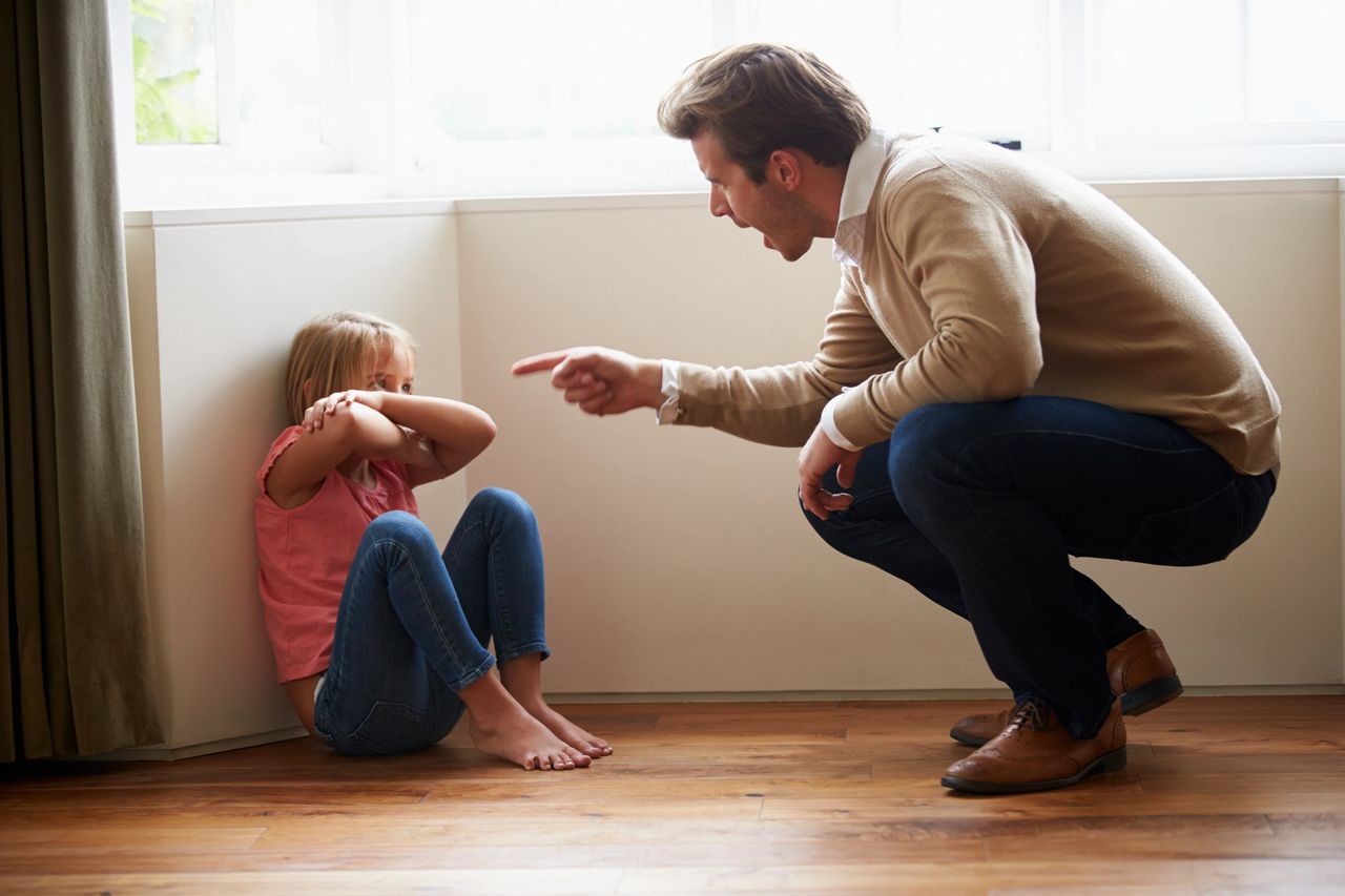 Father yelling at a child which represents verbal abuse causing complex post traumatic stress disorder