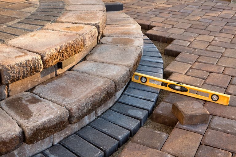 Patio landscape backyard paver stone outdoors patios retaining wall construction renovation brick