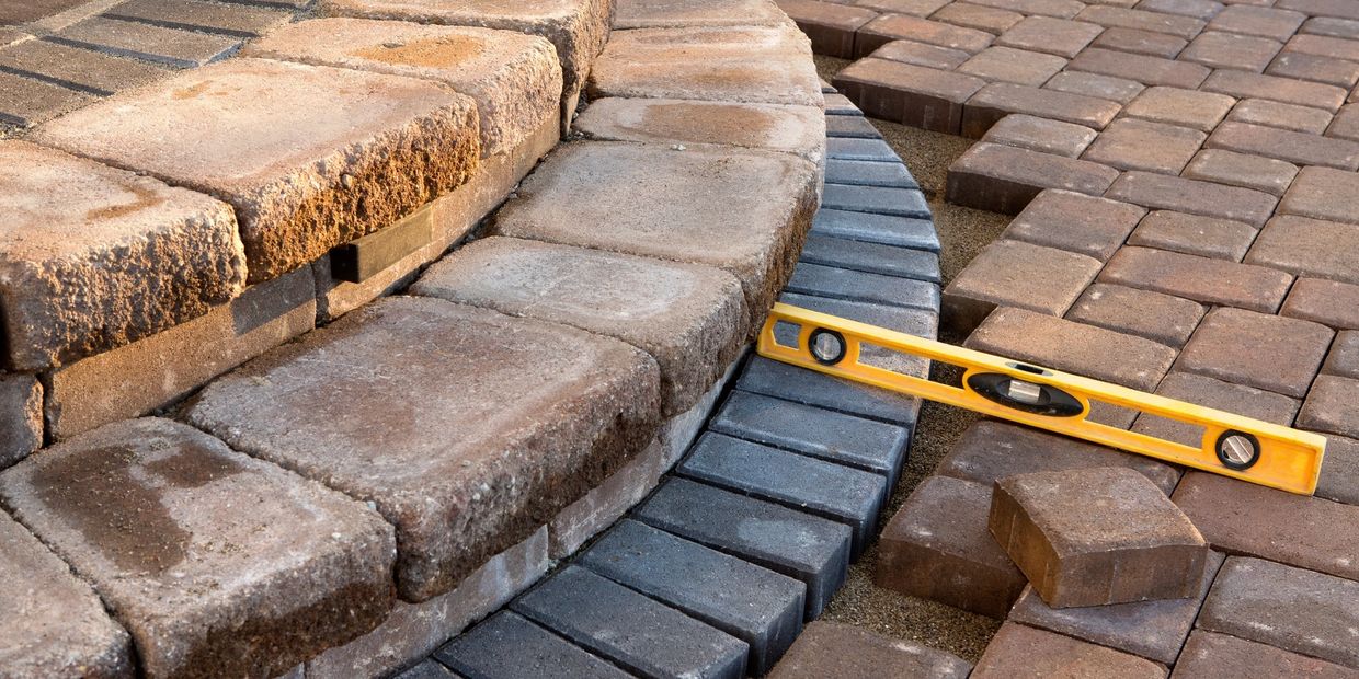 Hardscapes with brick and stone for landscaping, patios, and wealkways.