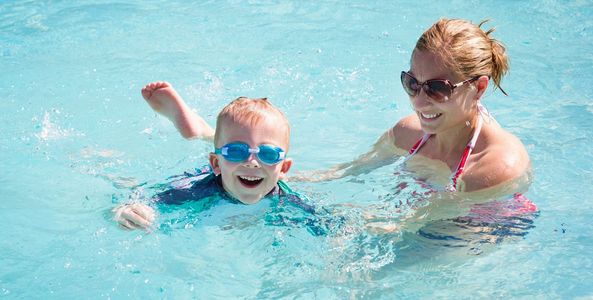 kids swimming in pool water in Connecticut