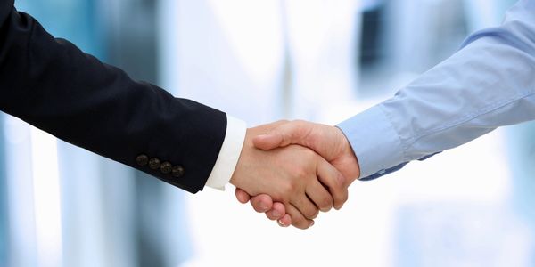 shaking hands to demonstrate partnership