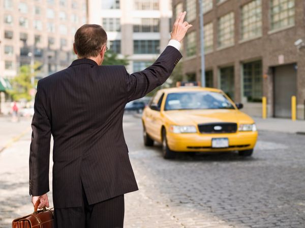 a man trying to call the taxi