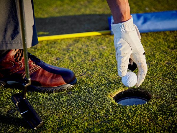 A person playing golf