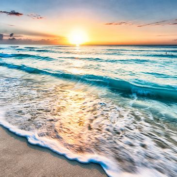 Exactly Travel showcases Beach sunset and waves Florida, Caribbean vacations