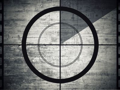 Vintage film countdown timer with a grunge texture background.